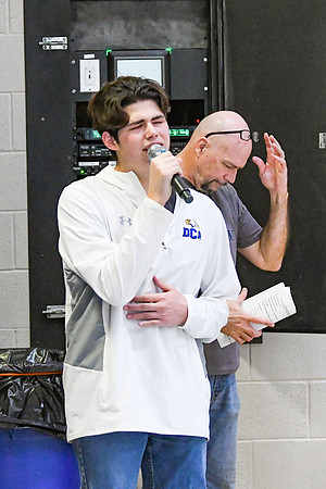 DSC_5078_edited - Kyle singing the National Anthem at Districts!
